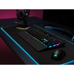 Corsair K70 PRO keyboard alongside Corsair wireless mouse and headset stand.