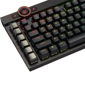 Close-up of the multi-function iCUE control wheel and six dedicated macro keys on the Corsair K100 RGB keyboard.