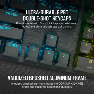 Close-up of PBT double-shot keycaps and the anodized brushed aluminum frame of the Corsair K100.