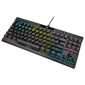 Isometric view of the Corsair K70 TKL with rainbow RGB lighting effects.