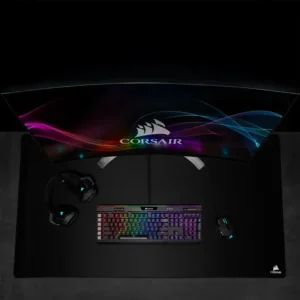 Overhead view of the Corsair K95 RGB Platinum XT on a large desk mat in a dark room.