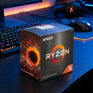 AMD Ryzen 5 5600 box on a gaming desk with RGB peripherals