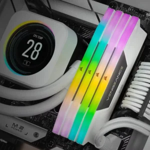 Four sticks of Corsair Vengeance RGB DDR5 white RAM installed in a motherboard next to an AIO liquid cooler