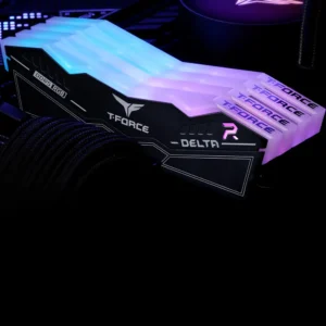 TeamGroup Delta RGB DDR5 memory installed next to an MSI motherboard cooler with matching purple lighting.