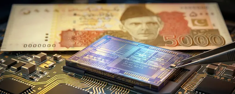 A glowing semiconductor chip on a computer motherboard with a blurred 1000 Pakistani Rupee note in the background.